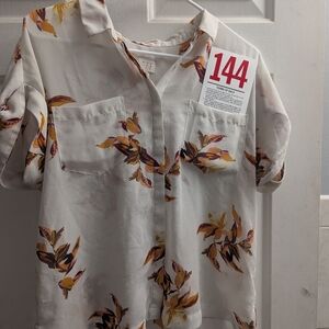 Lot 144 women's blouse brown leaf design.